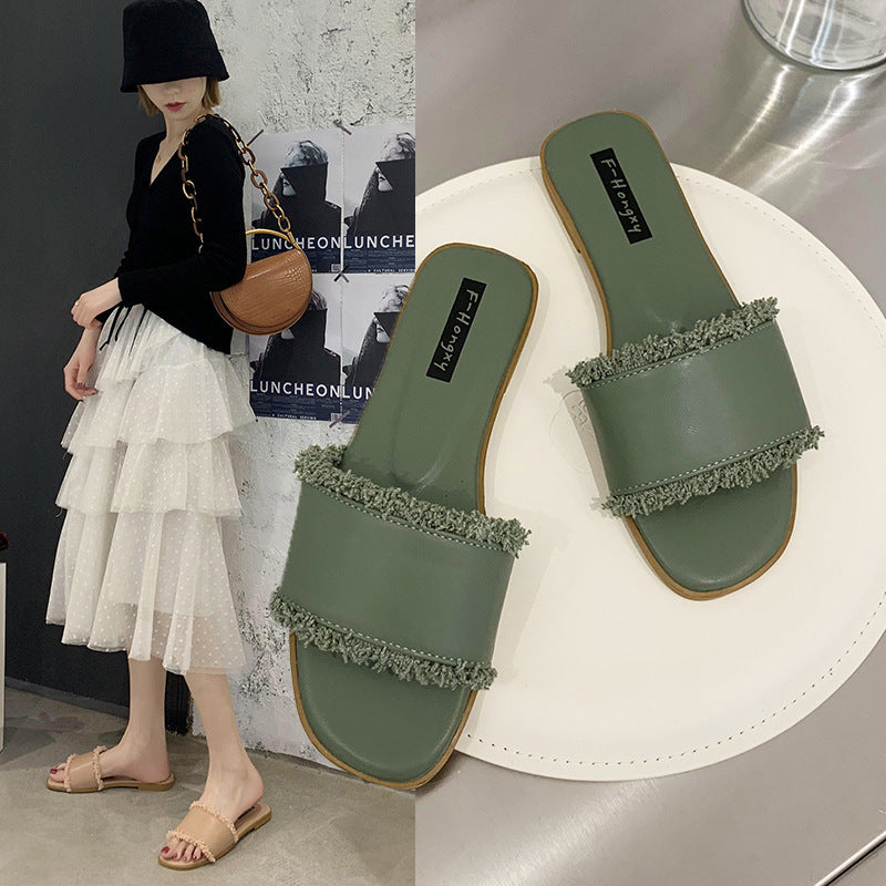 2020 summer new cool slippers women's Korean version flat-bottomed fashion outer wear one-word tassel cool slippers