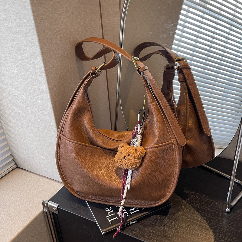 Autumn Internet celebrity explosion 2025 Korean version of the new fashion Mori dumpling bag simple and versatile casual messenger shoulder bag