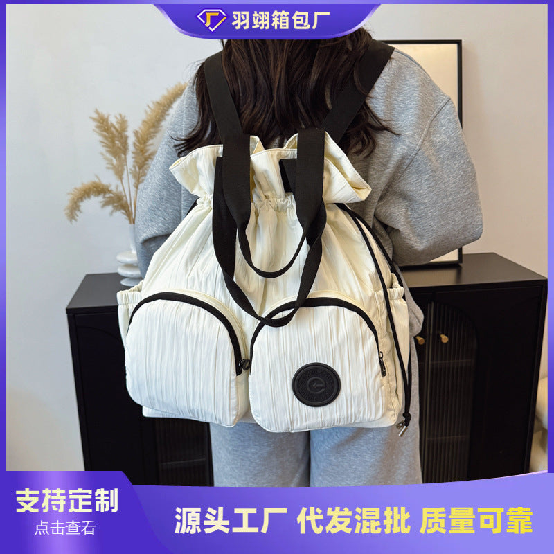 Cross-border college style high-value large-capacity backpack women's 2025 new niche pleated drawstring shoulder bag