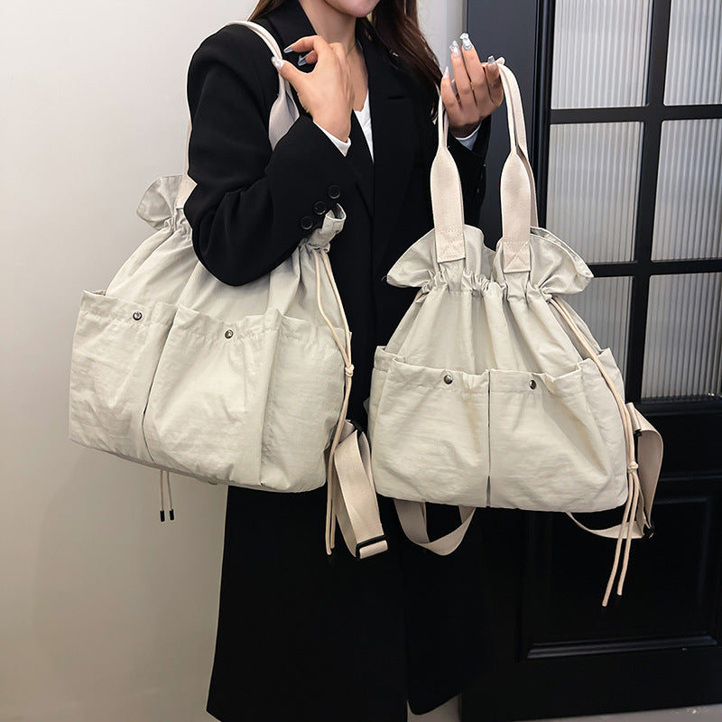 New backpack, cloud bag, drawstring model, multi-functional shoulder tote bag, travel bag, lightweight model, large-capacity women's bag.
