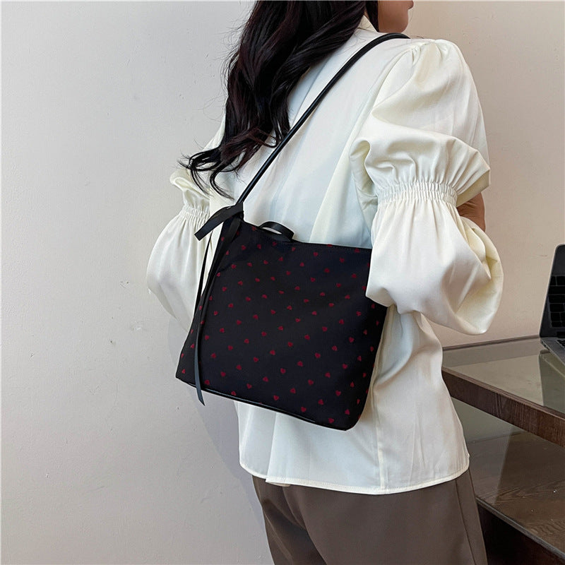 Canvas polka dot bag women's autumn 2025 new fashion commuter bow shoulder bag tote bucket women's bag