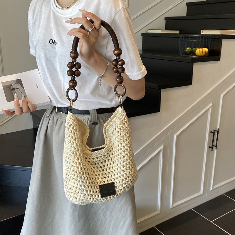 Casual large-capacity cotton thread woven bag New hollow hand-woven shoulder bag Vacation beach bag Versatile women's bag