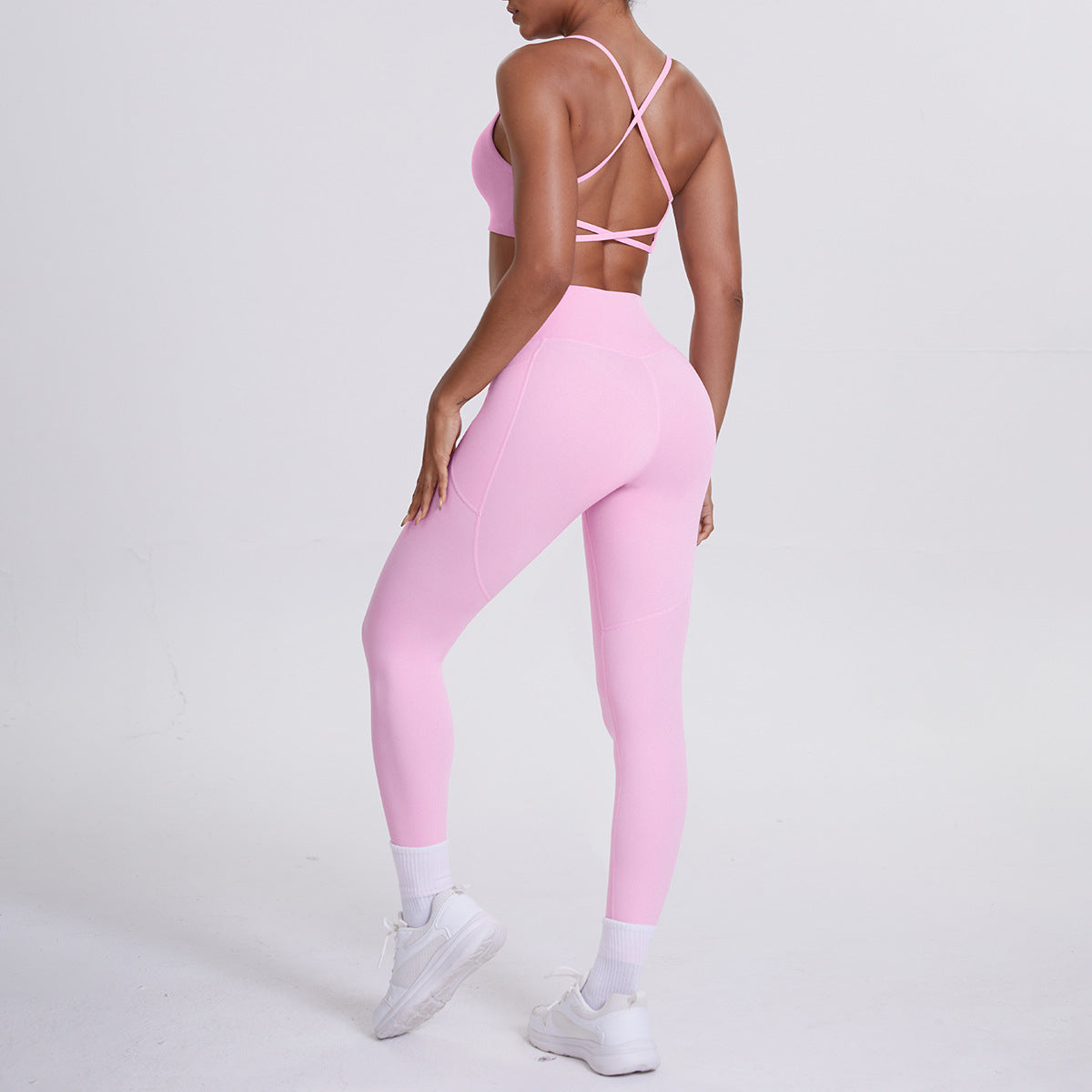 Spot European and American nude sports pocket trousers sexy suspenders sports beautiful back running fitness pants yoga suit set