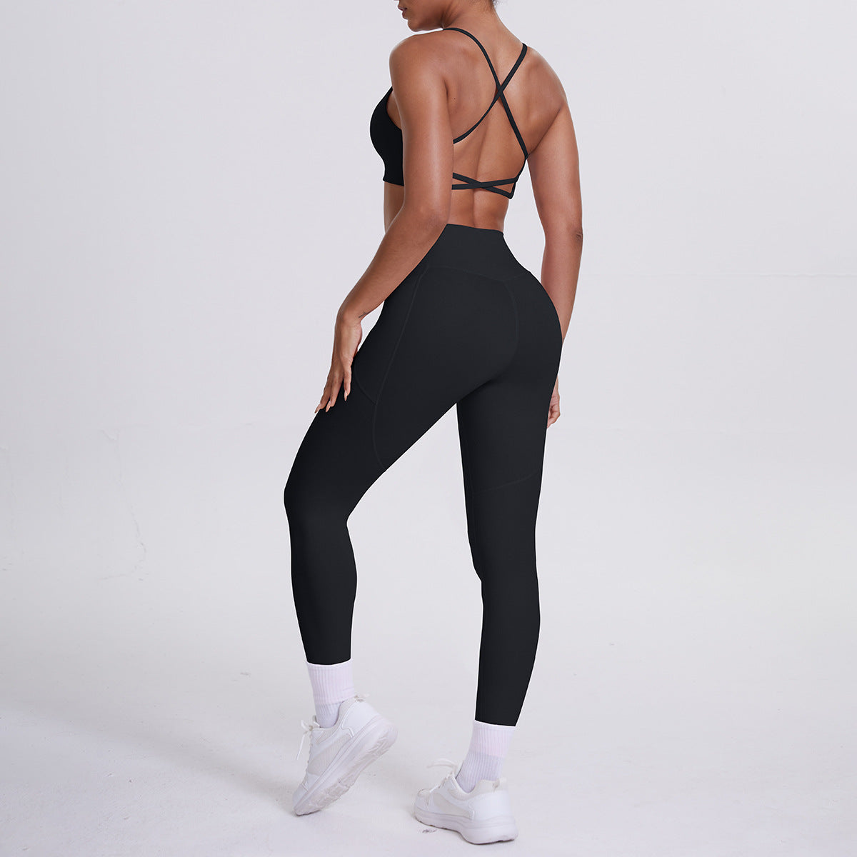 Spot European and American nude sports pocket trousers sexy suspenders sports beautiful back running fitness pants yoga suit set