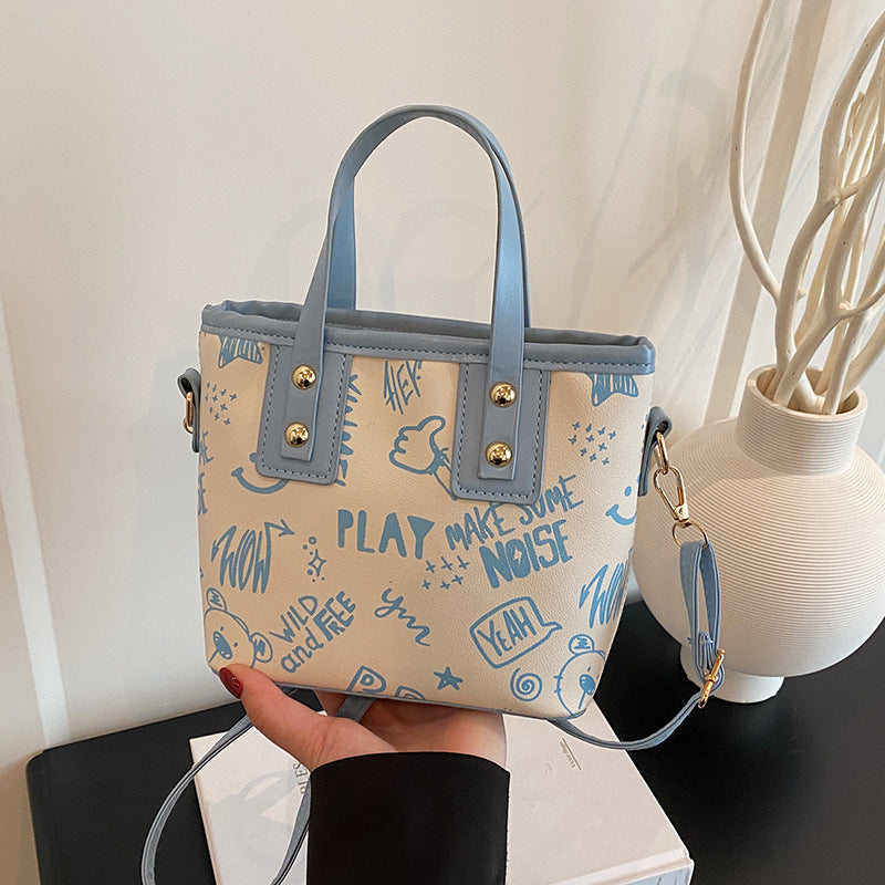 Cute cartoon printed bucket bag women 2025 new messenger bag women ins personality graffiti shoulder bucket bag