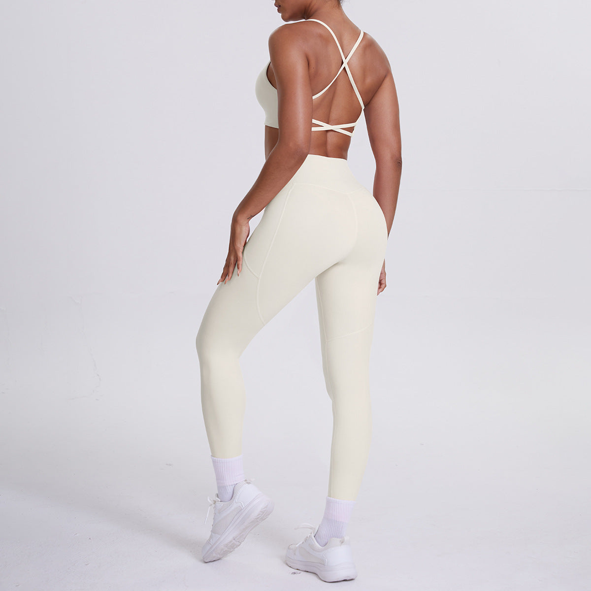 Spot European and American nude sports pocket trousers sexy suspenders sports beautiful back running fitness pants yoga suit set