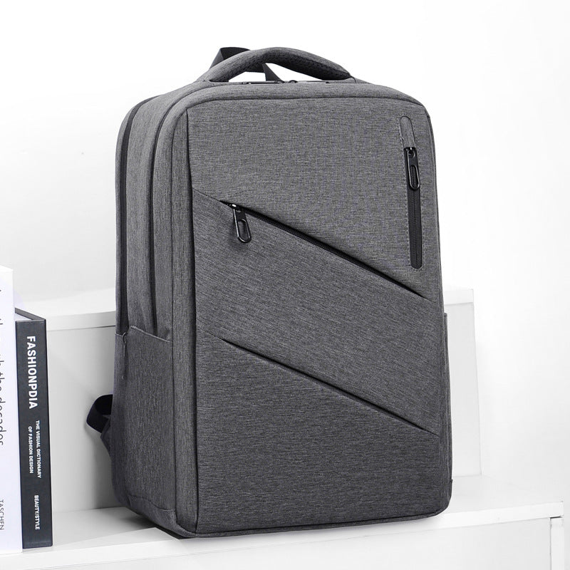 Cross-border logo customized men's backpack, fashionable and simple commuting 15.6-inch computer bag, anti-splashing casual backpack