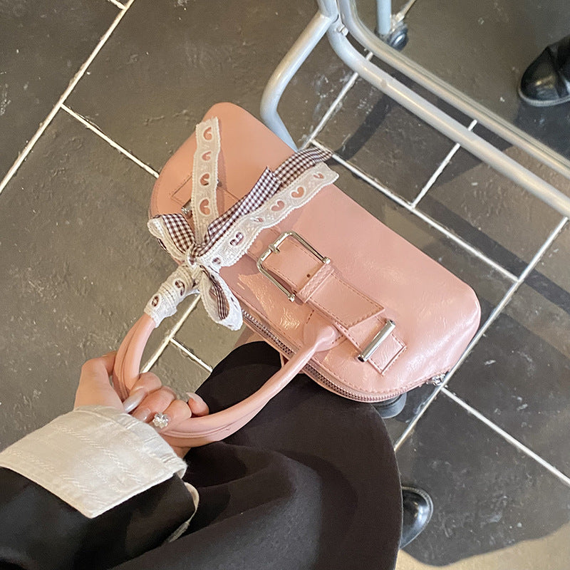 Dopamine girl hand shell bag 2025 spring and summer new Korean version shoulder bag fashion niche casual shoulder bag