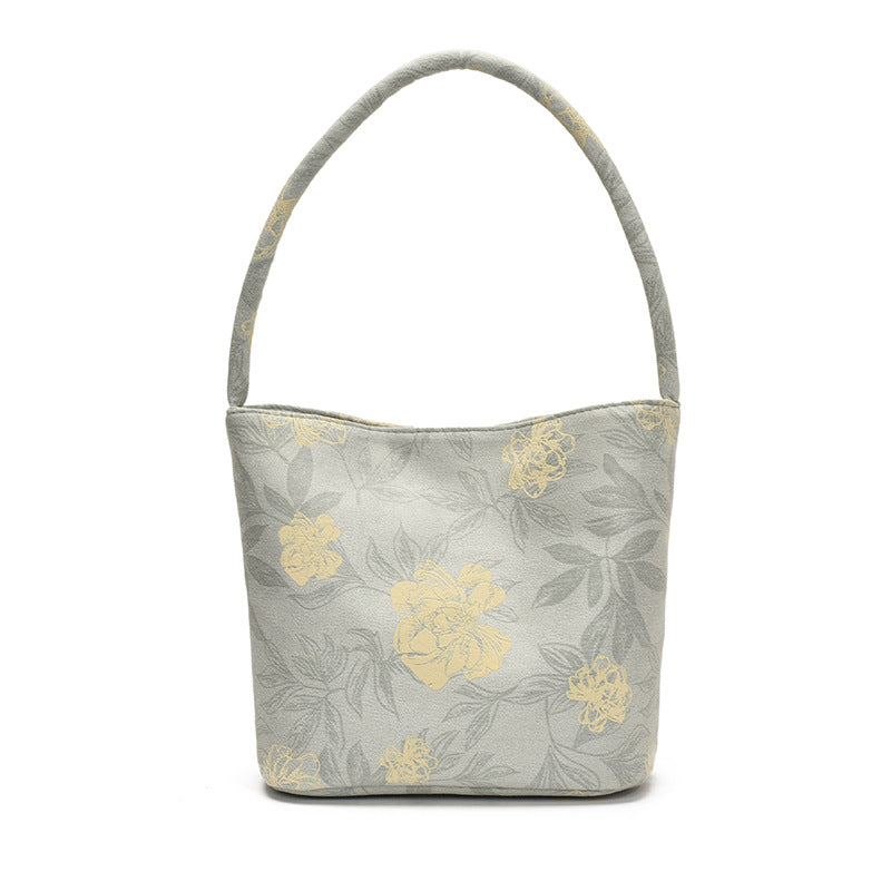 Fashion trend niche design bucket bag 2025 summer new foreign style casual texture women's shoulder messenger bag