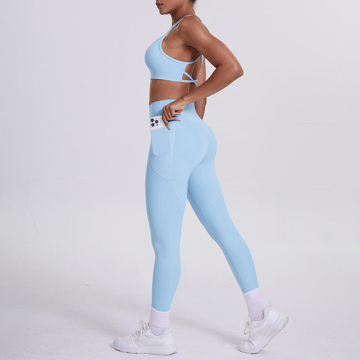 Spot European and American nude sports pocket trousers sexy suspenders sports beautiful back running fitness pants yoga suit set