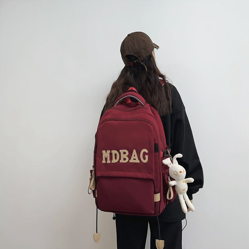 New schoolbag, girls, college students, high school students, burgundy backpack, junior high school students, large-capacity burden reduction backpack