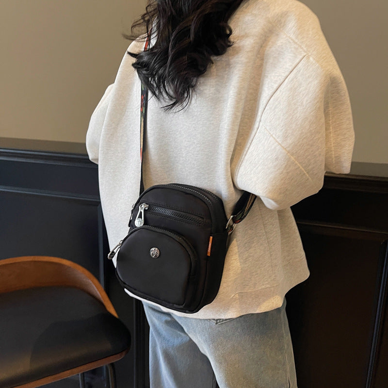 Foreign trade lightweight small cloth bag women's 2025 new summer fashion lightweight small satchel mobile phone bag multi-layer messenger bag