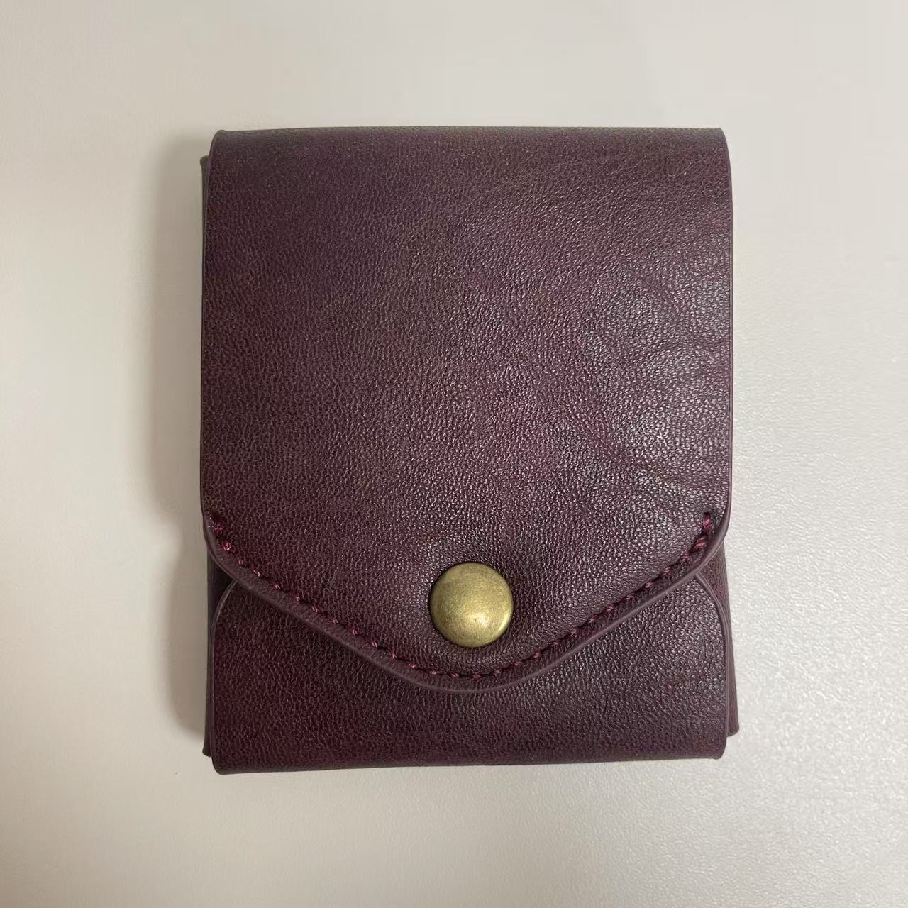 Retro accent men and women can use wallets with bullet pens, multi-functional change storage bags, simple and wear-resistant leather card bags