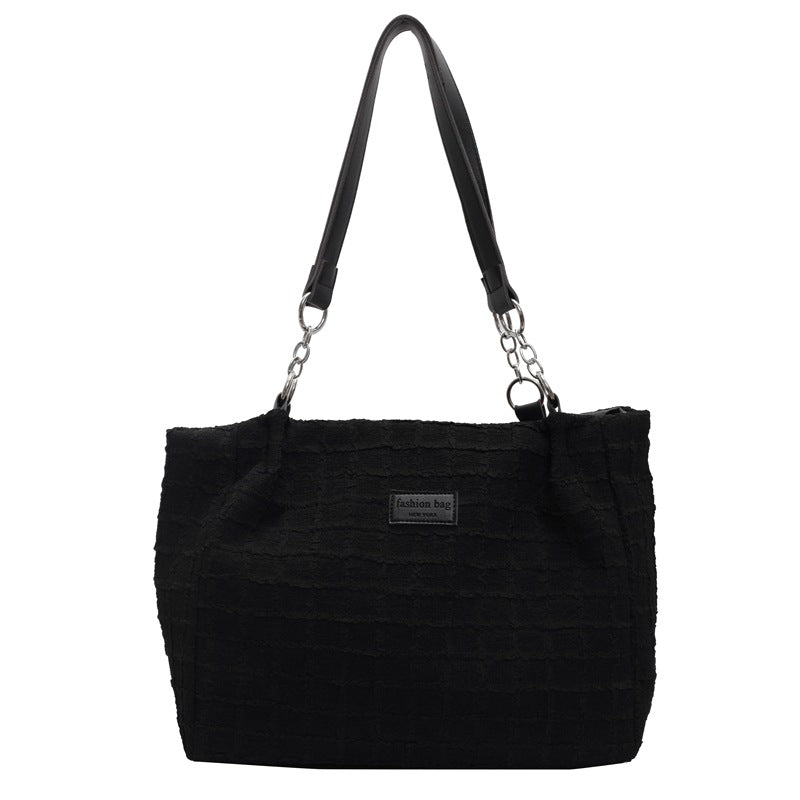 Canvas tote bag women's large capacity 2025 new casual shoulder bag summer versatile senior sense class commuter bag