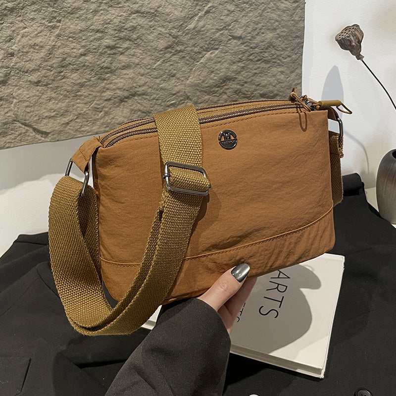 New fashionable and lightweight messenger bag women's large capacity multi-layer travel shopping small square bag simple and versatile messenger bag women