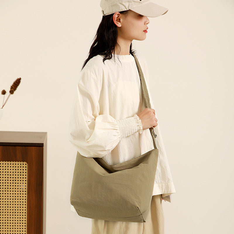 Cloud pleated drawstring shoulder strap bucket bag female solid color simple lazy wind shoulder bag slack niche messenger bag