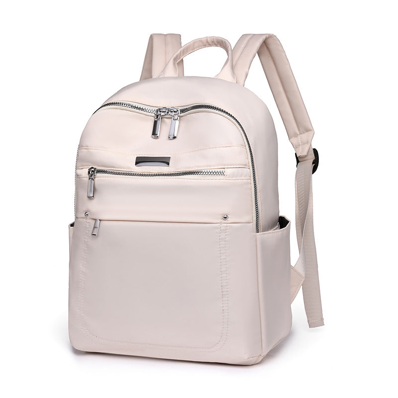 Solid color fashion casual versatile backpack simple trend lightweight business women's computer bag wholesale student schoolbag