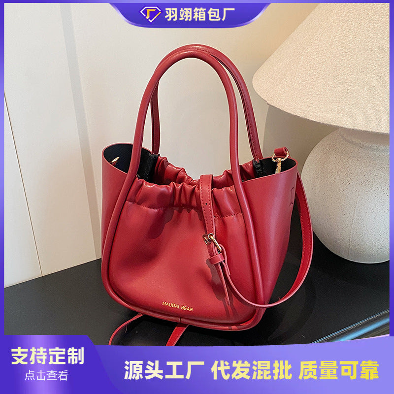 Foreign order high-quality texture foreign gas bucket bag women's 2025 summer new fashion commuter shoulder portable messenger bag