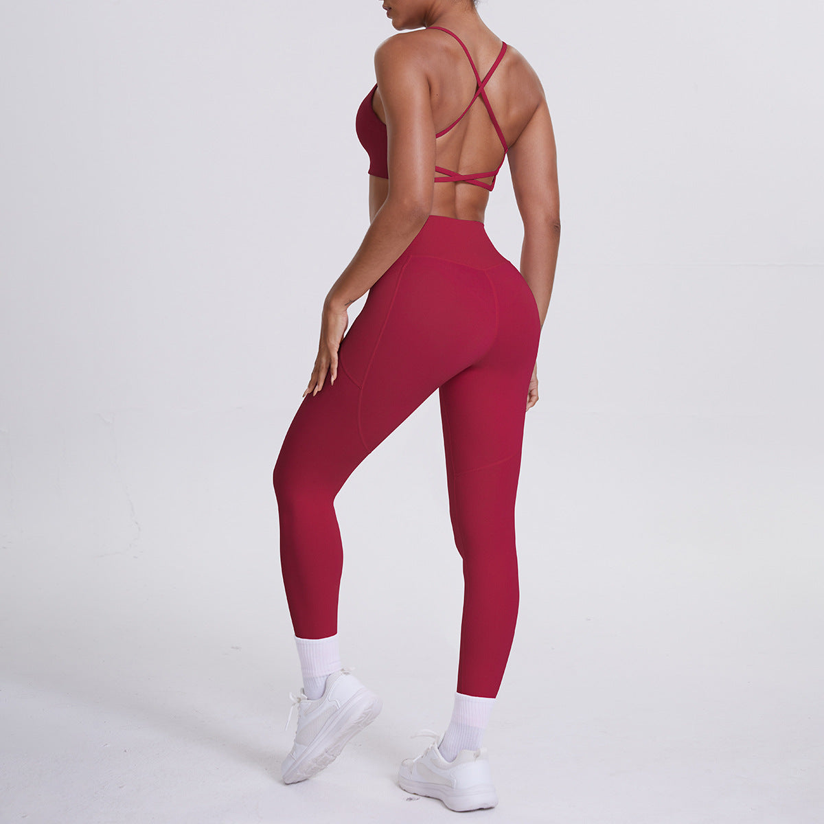 Spot European and American nude sports pocket trousers sexy suspenders sports beautiful back running fitness pants yoga suit set