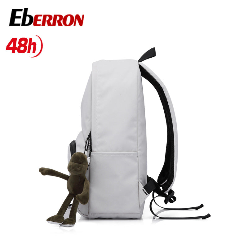 New simple and versatile schoolbag, high-value dirt-resistant belt, doll large-capacity backpack, male and female middle school student backpack.