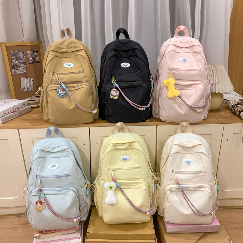 New personalized pain layer dual-purpose schoolbag large-capacity solid color removable pain bag primary school students middle school students backpack