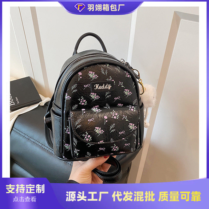 Cross-border backpack women's fashion versatile niche design Korean version student schoolbag casual texture lightweight travel backpack