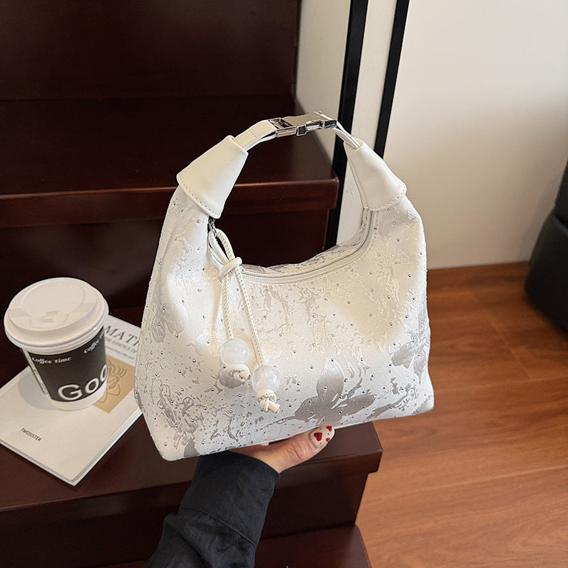 New Chinese style national style portable small bag women's 2025 summer new bento bag design sense personalized commuter messenger bag