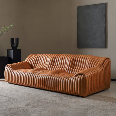 Minimalist mid-century modern genuine leather sofa for living room, homestay, designer american retro oil wax leather caramel color wavy sofa