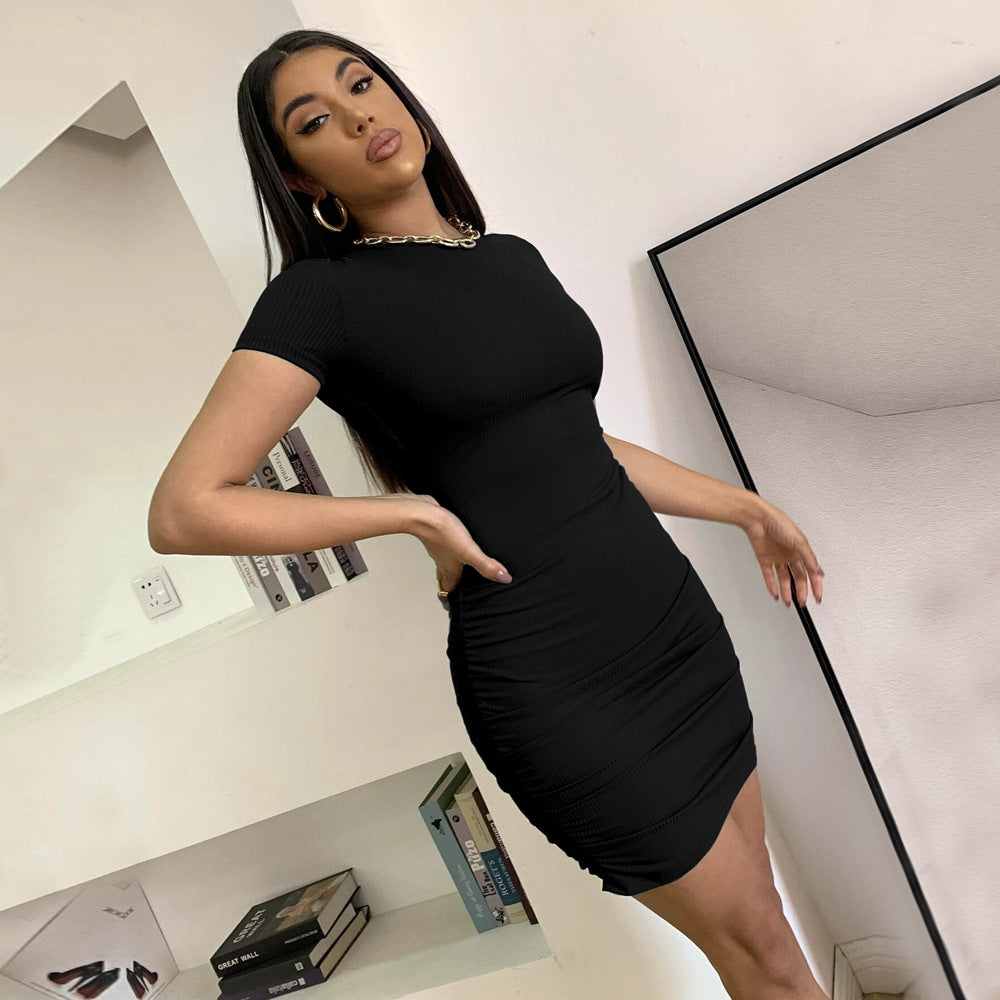 European and American  women's clothing sexy wind backless knitted dress summer new round neck pullover one-step short skirt women