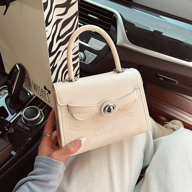 Simple contrasting color small bag women's 2025 summer new portable small square bag advanced super fire niche texture messenger bag