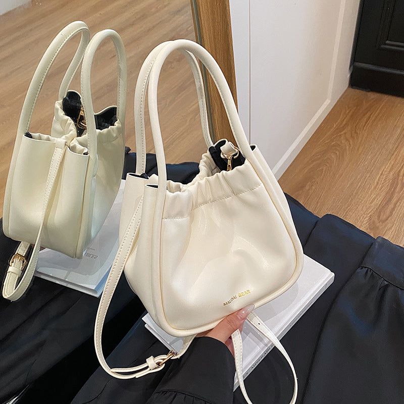 Foreign order high-quality texture foreign gas bucket bag women's 2025 summer new fashion commuter shoulder portable messenger bag