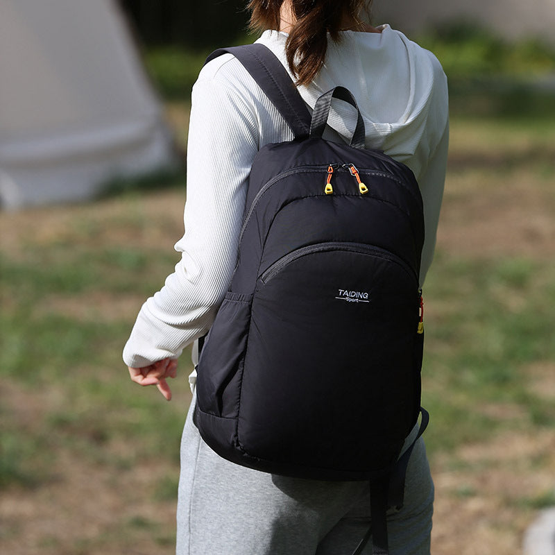 New foldable storage backpack women's travel bag simple casual nylon lightweight outdoor backpack schoolbag