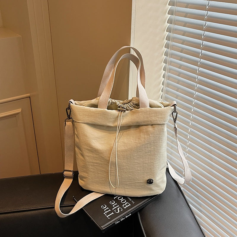 Casual bag women's 2025 new nylon drawstring bundle shoulder bag fitness yoga messenger bag commuter tote bag