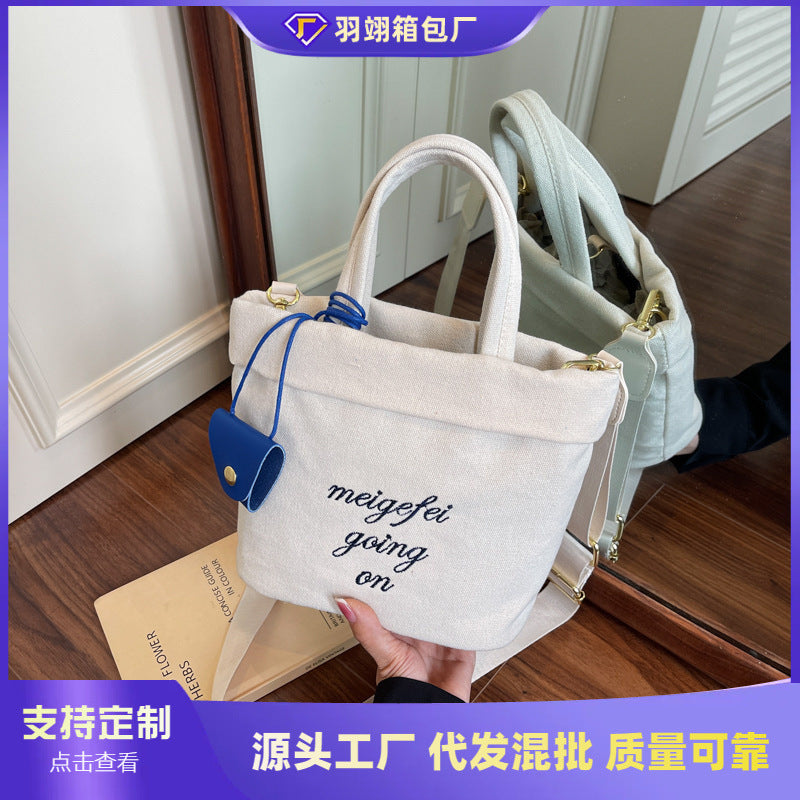 Cross-border alphabet canvas bag women's 2025 new trendy summer fashion bucket bag high-end large-capacity shoulder bag