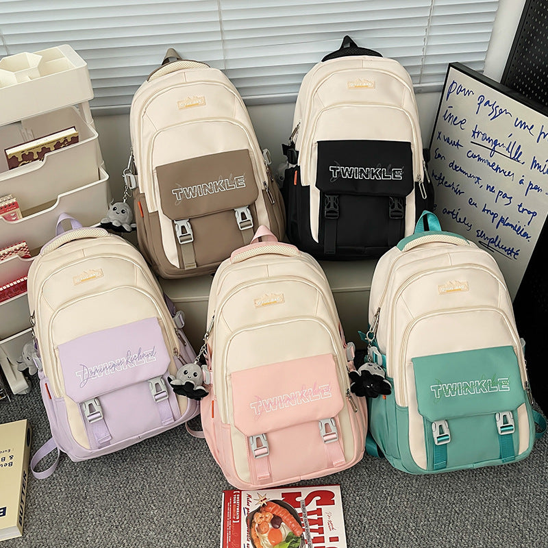 New primary school students, junior high school students, burden-reducing schoolbags, fashionable contrasting colors, lightweight, large-capacity waterproof backpacks