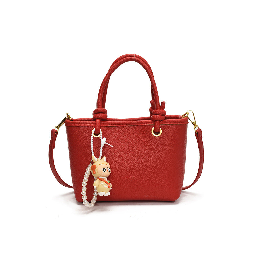 Foreign trade advanced sense hand carrying bucket bag 2025 summer simple and versatile shoulder bag trendy niche design messenger bag