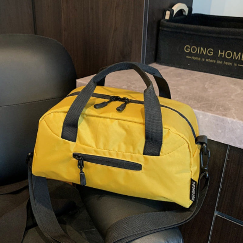 Cross-border women's lightweight handbags, large-capacity business travel bags, luggage bags, sports fitness bags, shoulder messenger bags.