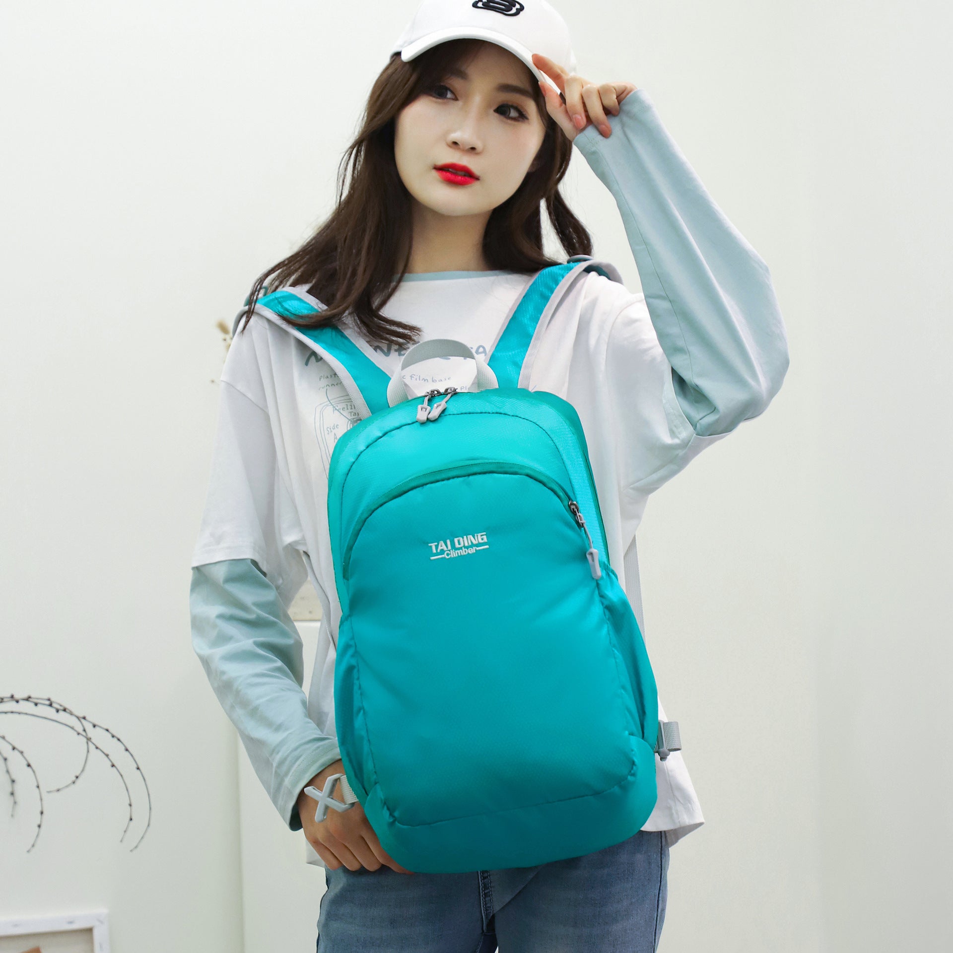 New backpack, portable female mountaineering outdoor sports travel bag, cycling large-capacity folding set, fanny pack.