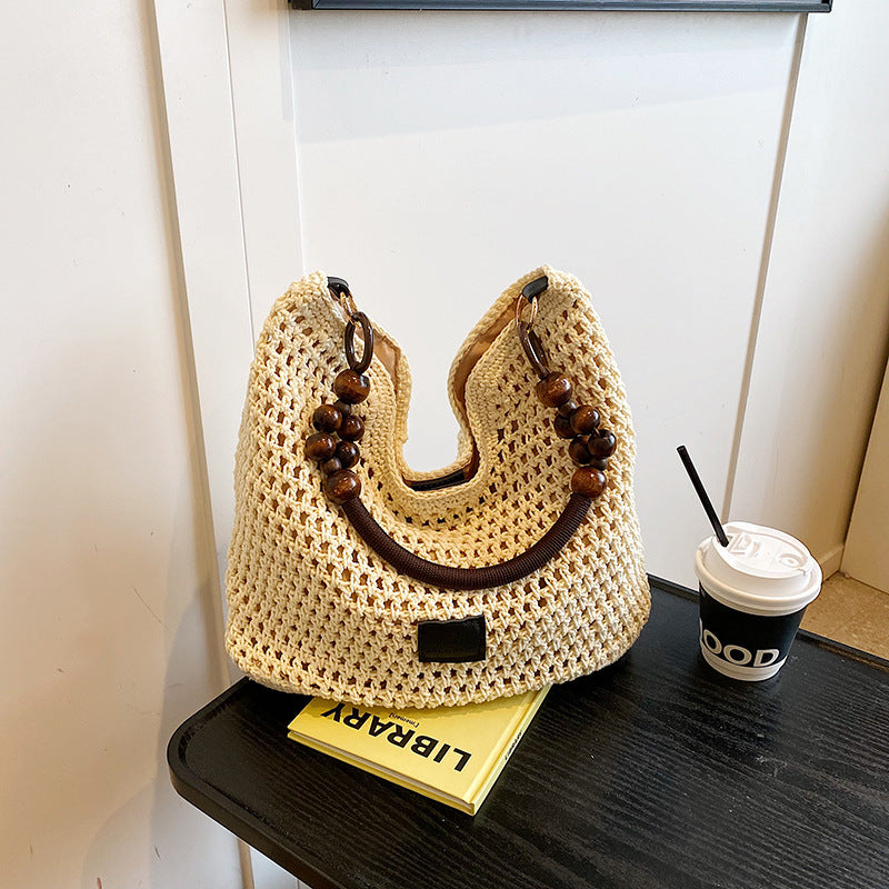 Casual large-capacity cotton thread woven bag New hollow hand-woven shoulder bag Vacation beach bag Versatile women's bag