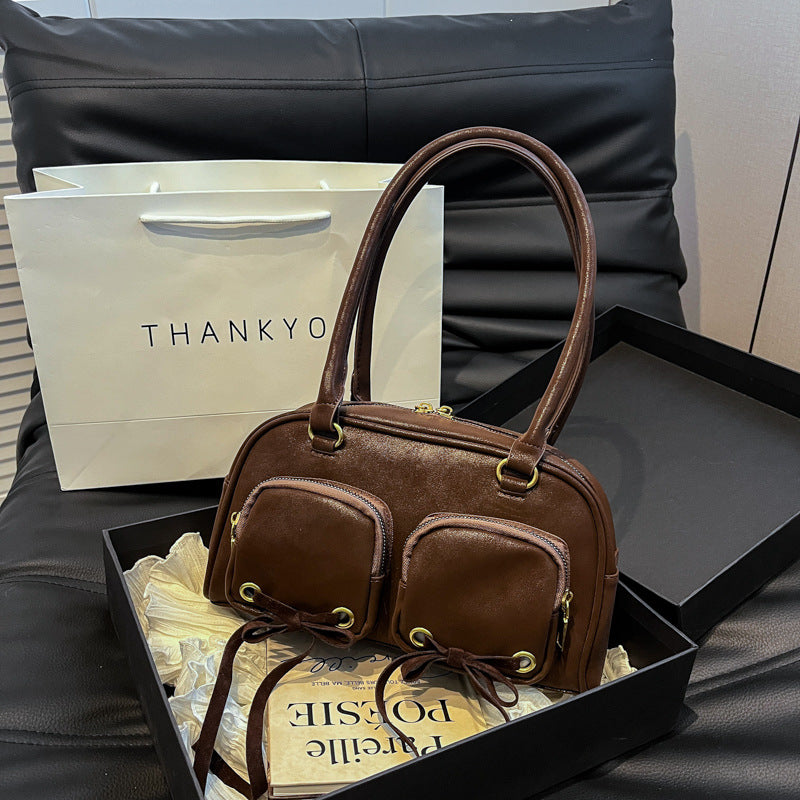 Simple retro underarm bag women's 2025 winter new Korean version niche portable commuter shoulder bag