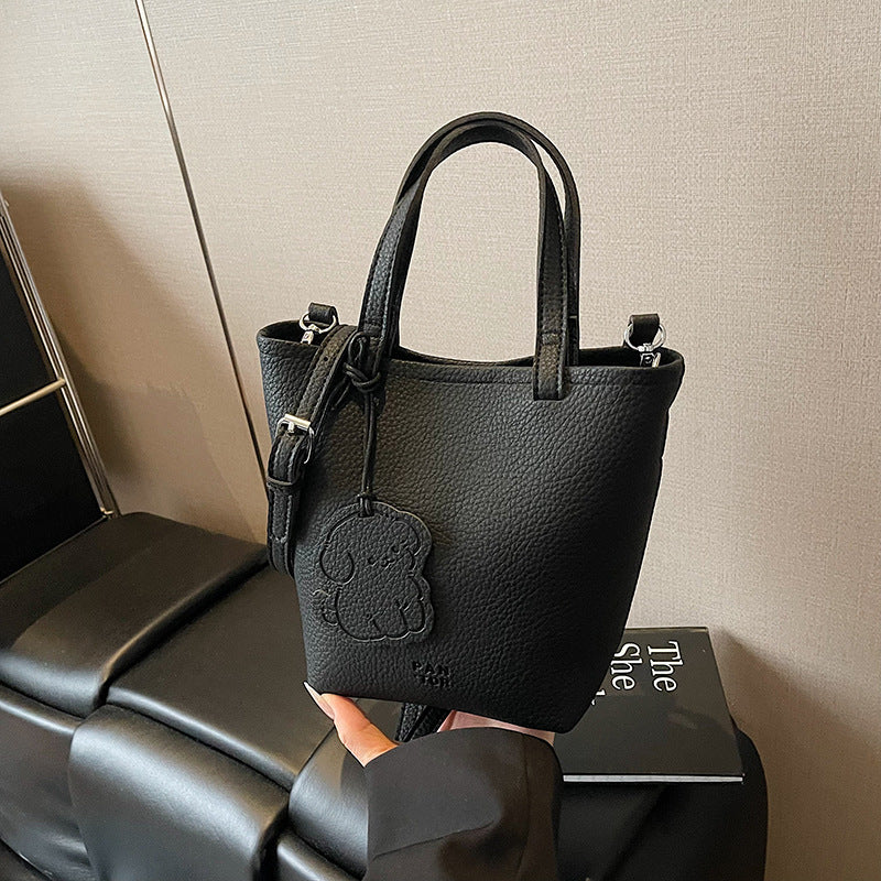 Cross-border simple casual portable bucket bag women's 2025 new fashion shoulder bag commuter versatile messenger bag