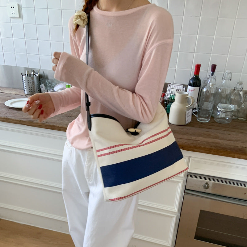 Fashion super hot niche bag women 2025 new casual versatile messenger bag summer popular handbag bucket bag