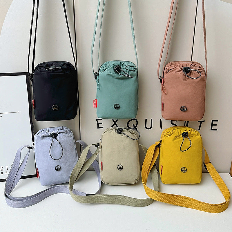 New messenger bag, multi-functional mobile phone bag, waterproof leisure shoulder bag, kettle bag, sports fitness women's bag, water cup bag.