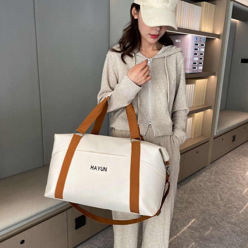 New fitness bag large-capacity travel bag oblique span short-distance business trip luggage bag women's lightweight waterproof clothing storage bag