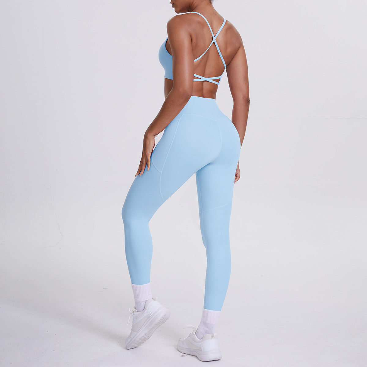 Spot European and American nude sports pocket trousers sexy suspenders sports beautiful back running fitness pants yoga suit set