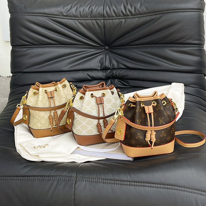 Cross-border women's fashion messenger bag new niche design drawstring bucket bag old flower women's bag commuter shoulder bag