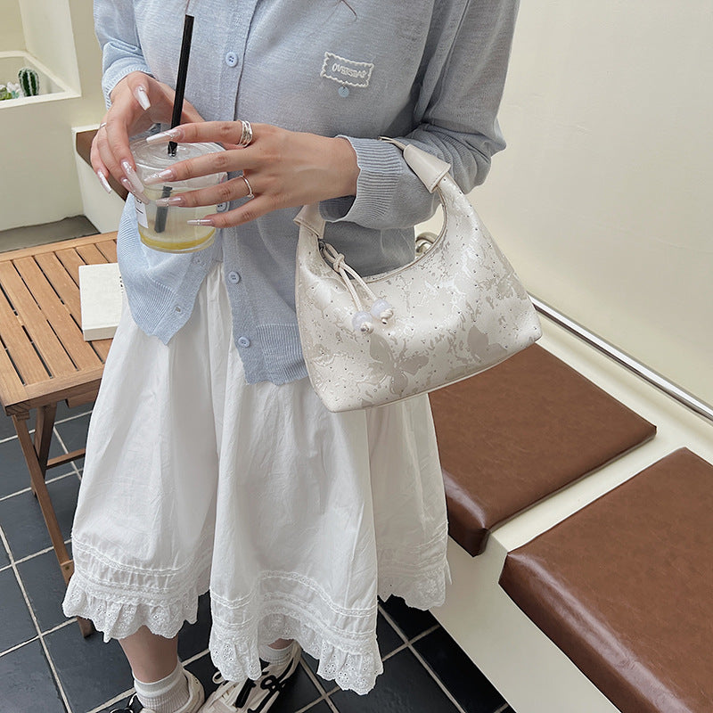 New Chinese style national style portable small bag women's 2025 summer new bento bag design sense personalized commuter messenger bag