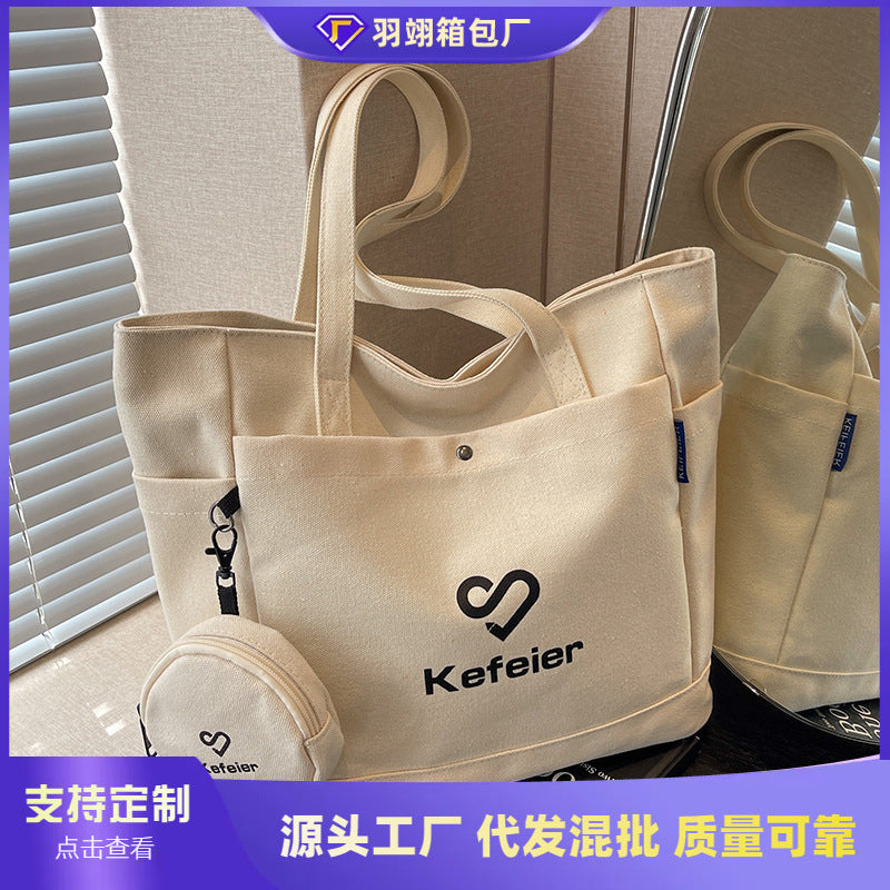 Canvas bag, women's large-capacity 2023 new high-end shoulder bag, college student class versatile commuter tote bag