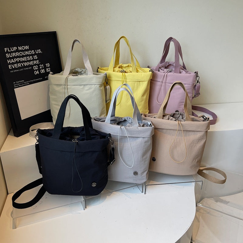 Casual bag women's 2025 new nylon drawstring bundle shoulder bag fitness yoga messenger bag commuter tote bag