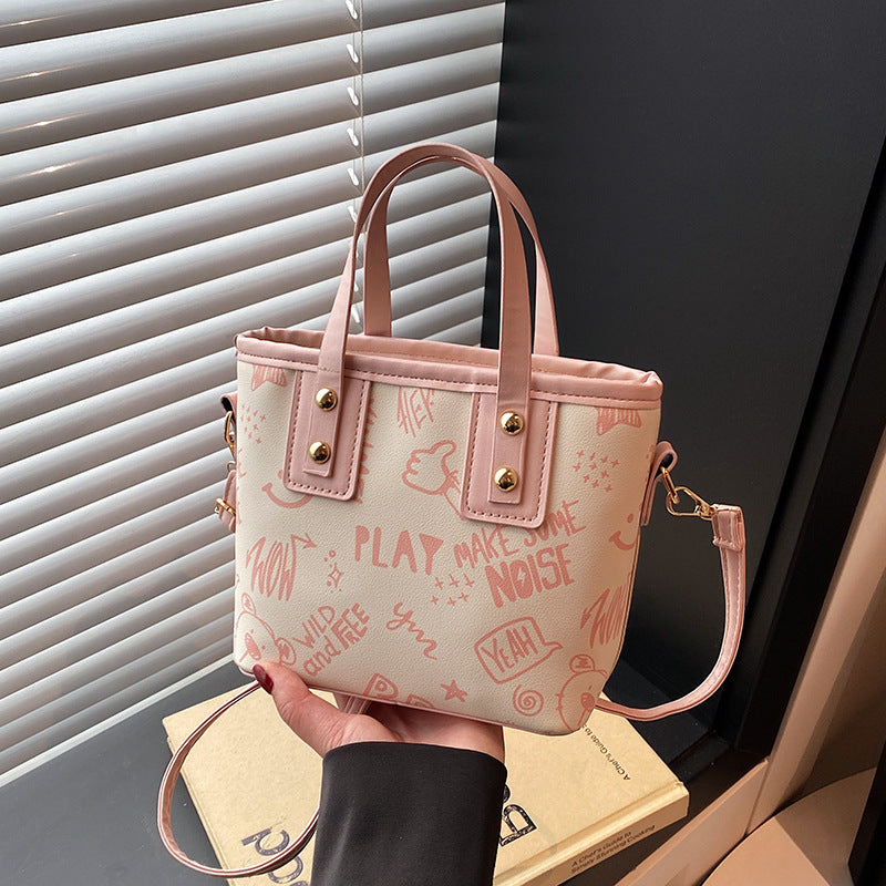 Cute cartoon printed bucket bag women 2025 new messenger bag women ins personality graffiti shoulder bucket bag